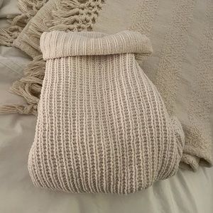 White turtleneck sweater